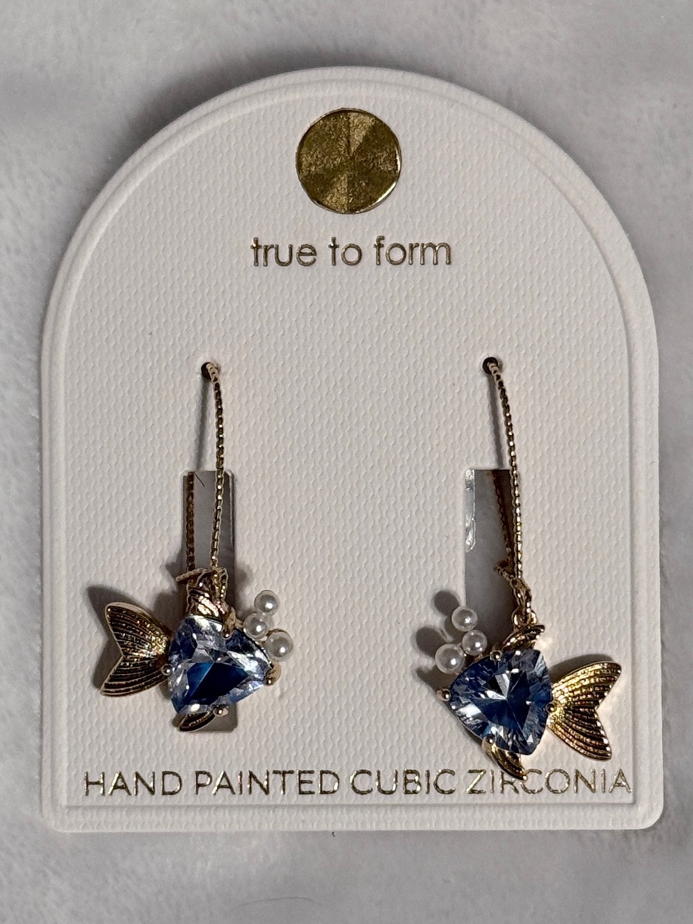 True to Form Gold Fish Drop Earrings with Light Blue Stones
